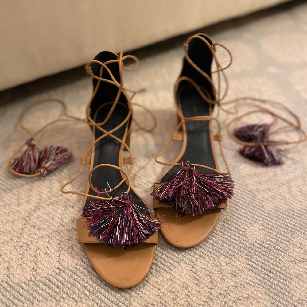 Nude block heel sandal with colorful pom poms